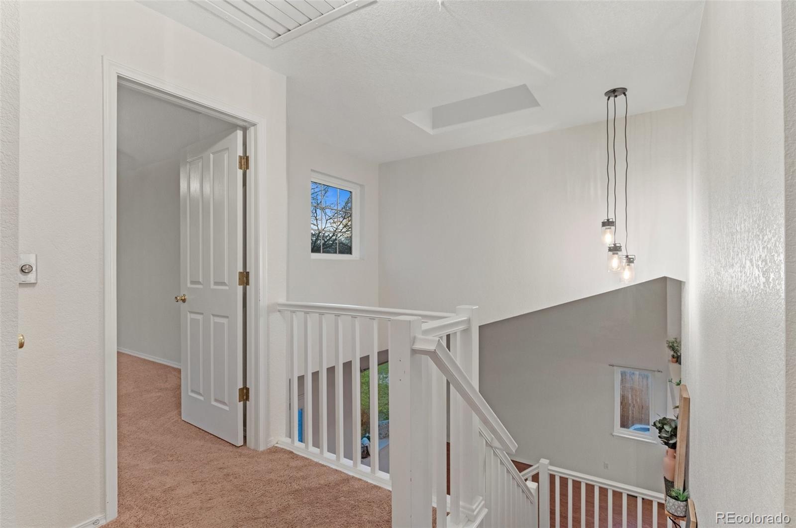 12734 Eudora Drive Thornton, CO 80241 - Photo 19 of 49 a view of entryway with stairs
