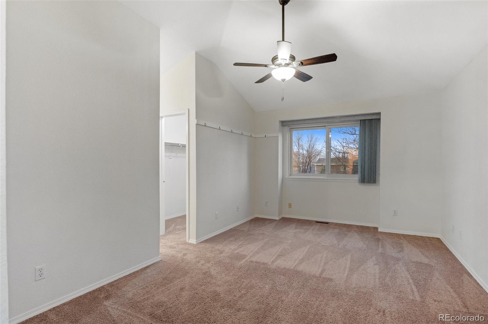 12734 Eudora Drive Thornton, CO 80241 - Photo 22 of 49 a view of an empty room with a window