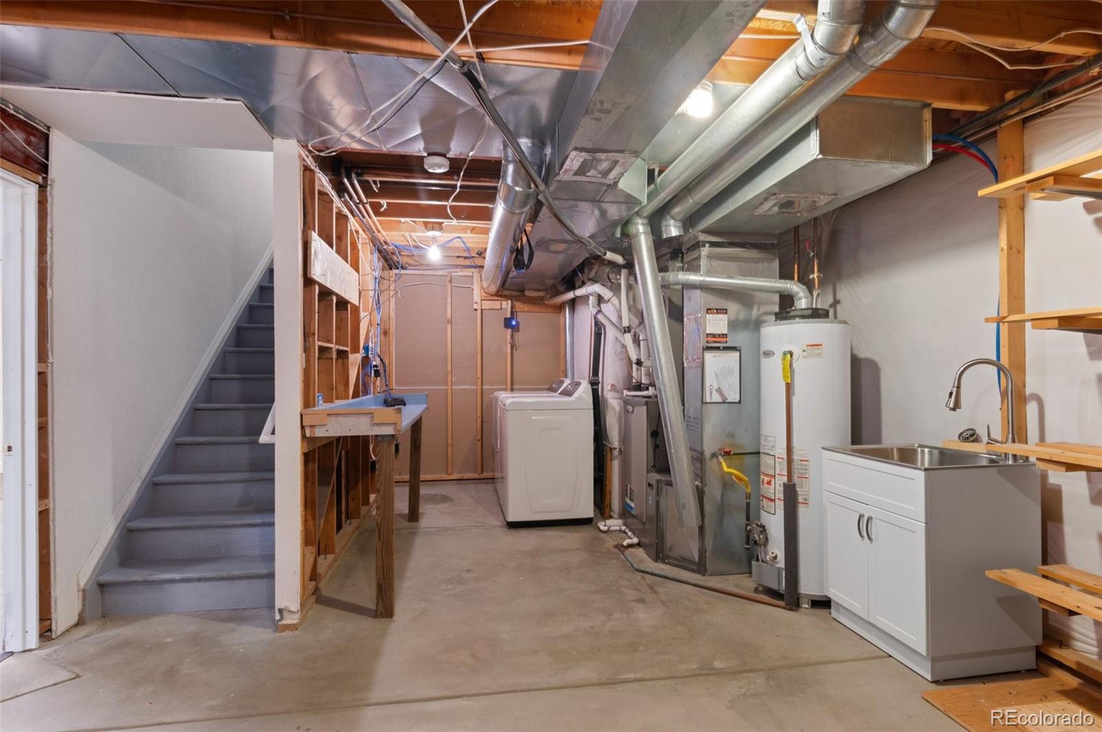 12734 Eudora Drive Thornton, CO 80241 - Photo 28 of 49 a view of storage and utility room