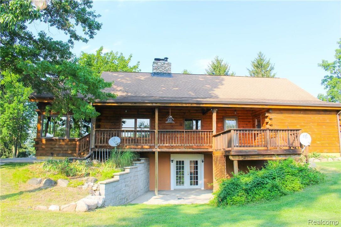 4165 Morgan Road Lake Orion, MI 48359 - Photo 5 of 81 Walk out w/ patio. Impressive cedar decking (front and back of home)