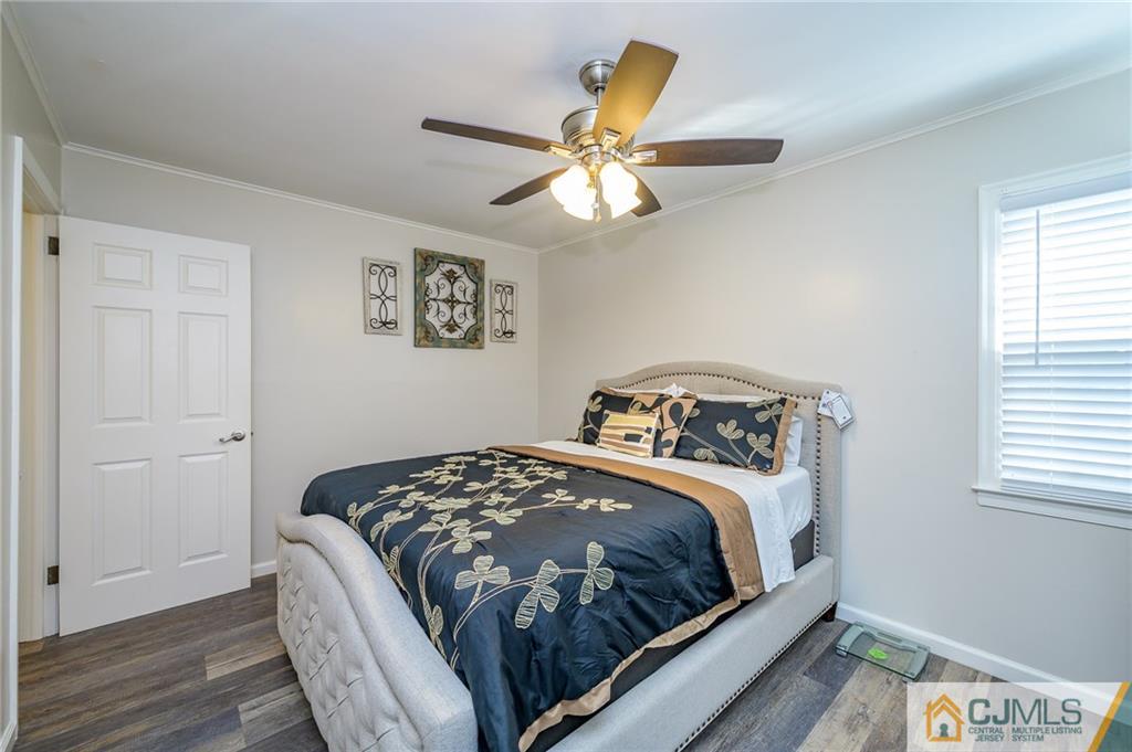 14 Sine Road Edison, NJ 08817 - Photo 17 of 33 a bedroom with a bed and a window