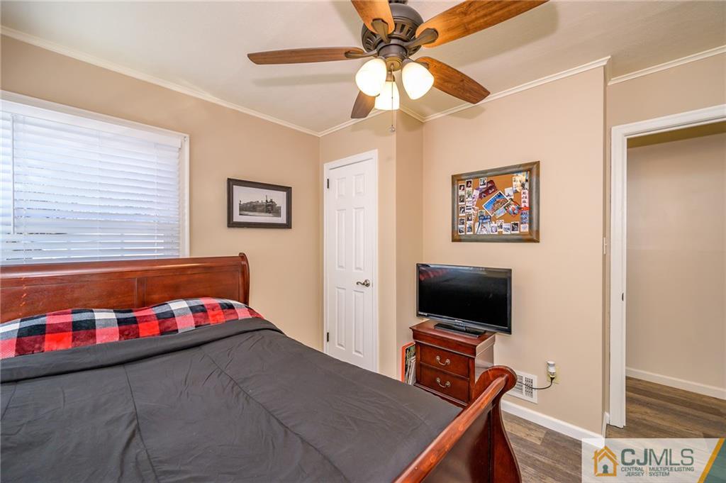 14 Sine Road Edison, NJ 08817 - Photo 23 of 33 a living room with a flat screen tv