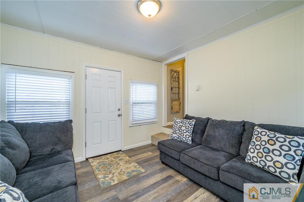 14 Sine Road Edison, NJ 08817 - Photo 28 of 33 a living room with furniture and a couch