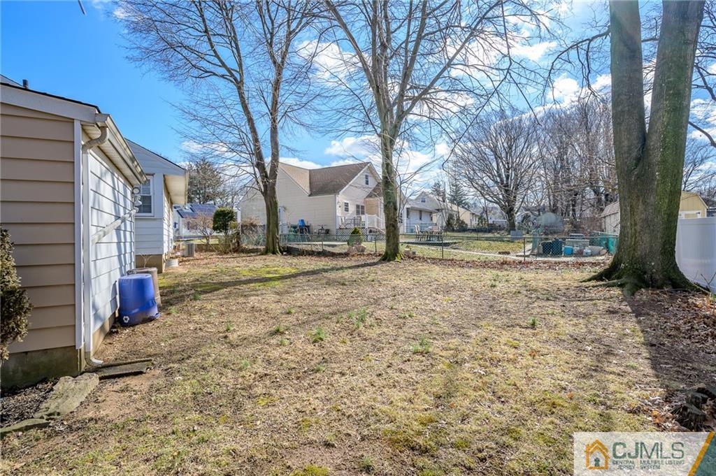 14 Sine Road Edison, NJ 08817 - Photo 31 of 33 a view of a yard with a tree