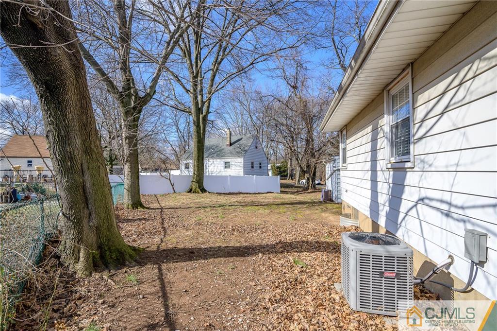 14 Sine Road Edison, NJ 08817 - Photo 32 of 33 a view of a house with a yard