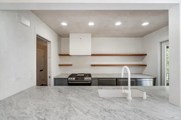 a view of a livingroom with wooden floor