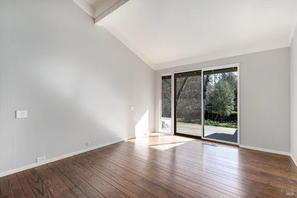 a view of sitting area in the balcony of a house