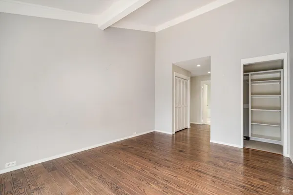 a view of backyard of house with seating space