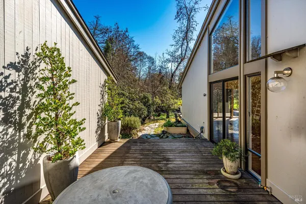 a view of a field with trees in the background