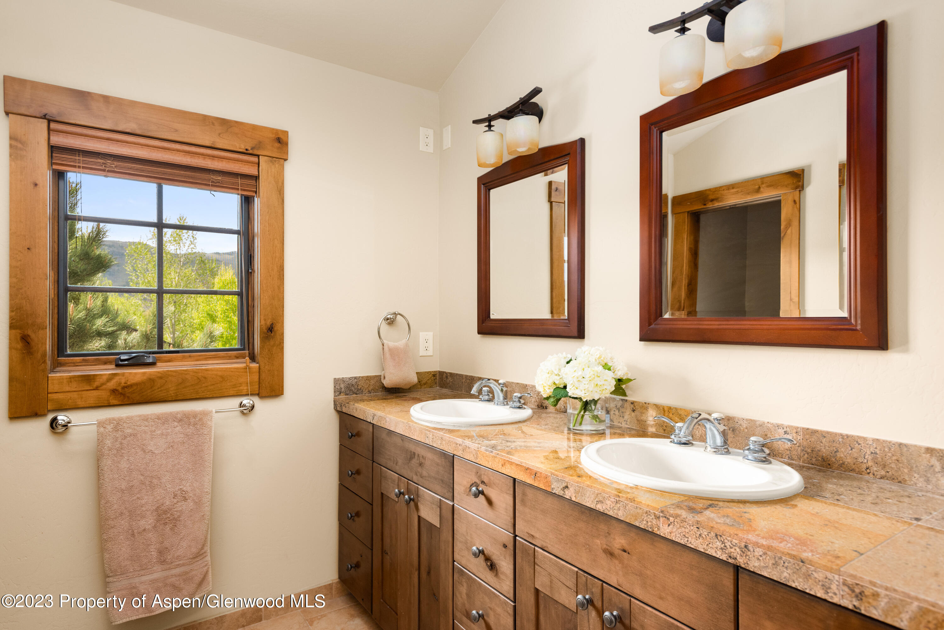 141 Juniper Trail Carbondale, CO 81623 - Photo 14 of 21 a bathroom with a granite countertop sink and a mirror