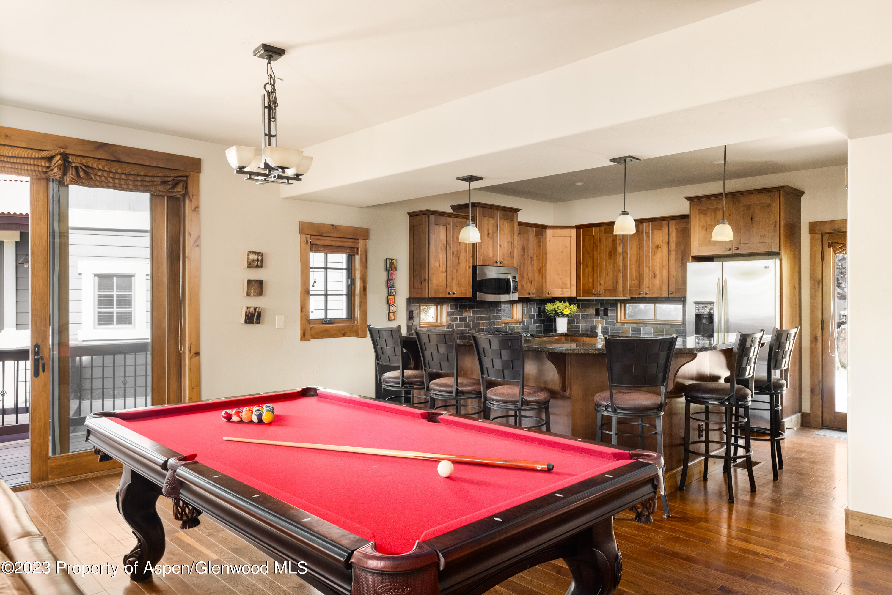 141 Juniper Trail Carbondale, CO 81623 - Photo 4 of 21 a room with pool table and windows