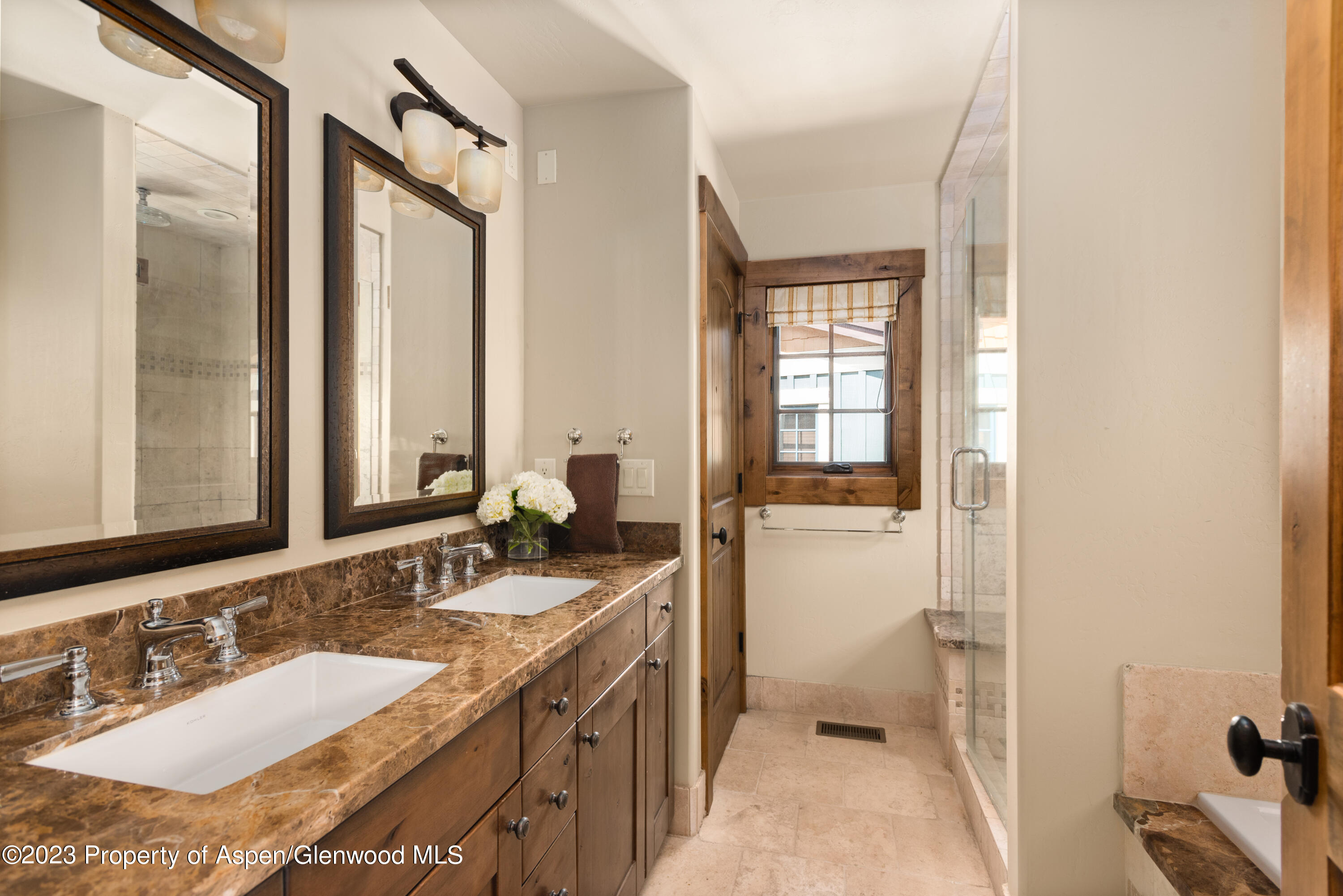 141 Juniper Trail Carbondale, CO 81623 - Photo 9 of 21 a bathroom with a sink double vanity and a mirror