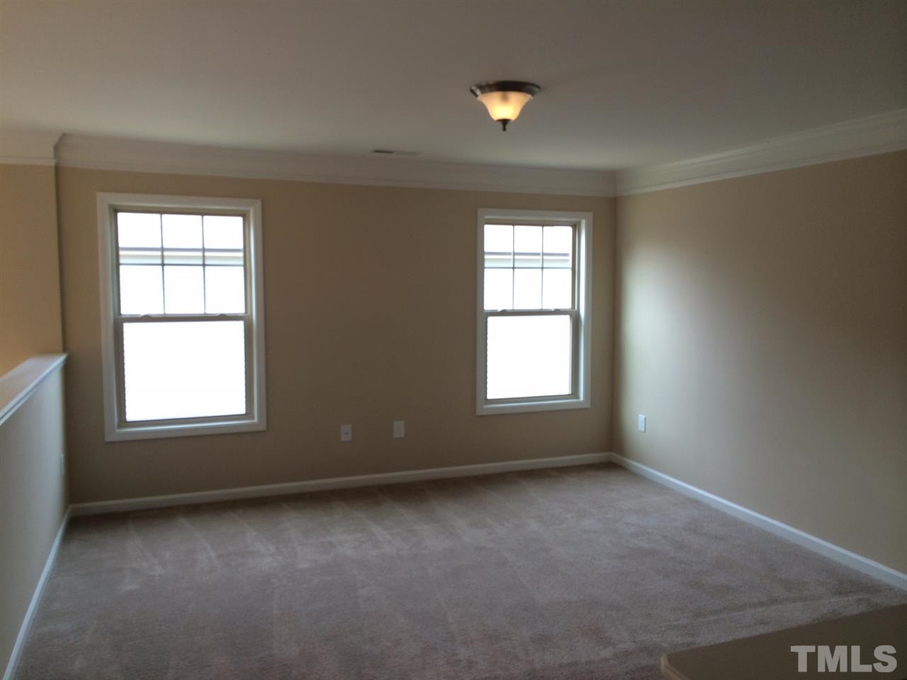 7609 Channery Way Raleigh, NC 27616 - Photo 11 of 25 an empty room with a window