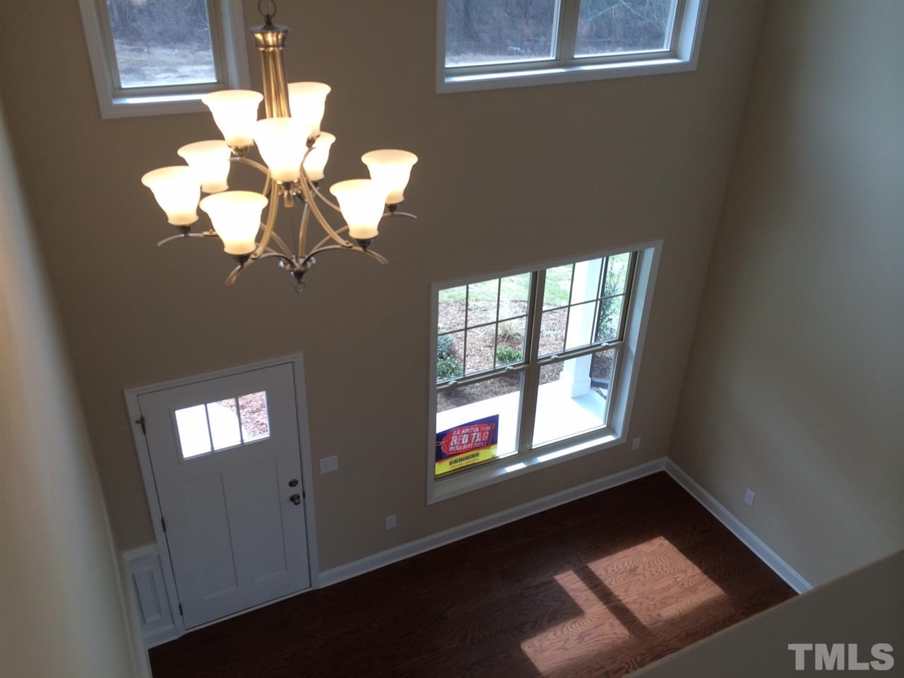 7609 Channery Way Raleigh, NC 27616 - Photo 14 of 25 a view of entryway with chandelier