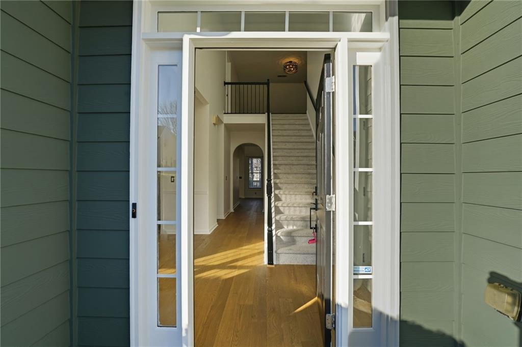205 Towne Ridge Drive Woodstock, GA 30188 - Photo 12 of 56 a bathroom with a glass door shower and a sink