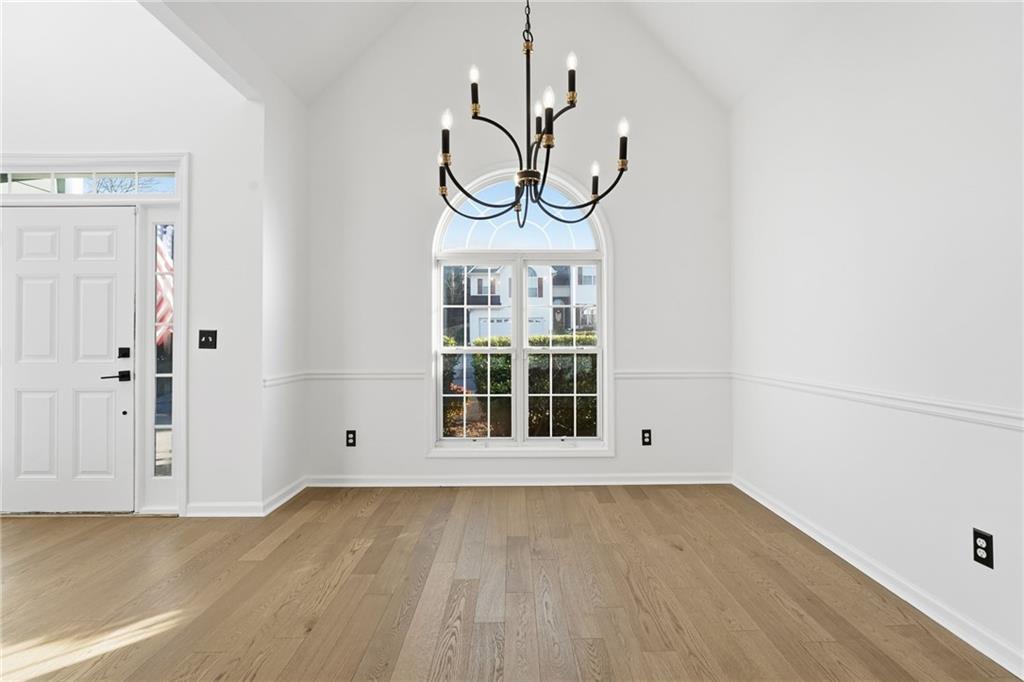205 Towne Ridge Drive Woodstock, GA 30188 - Photo 17 of 56 a view of an empty room with a window