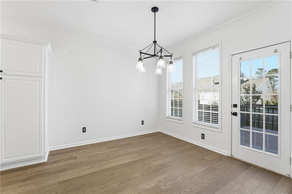 205 Towne Ridge Drive Woodstock, GA 30188 - Photo 25 of 56 a view of empty room with windows