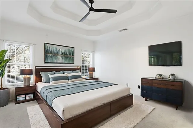 a bathroom with double vanity sink and a mirror