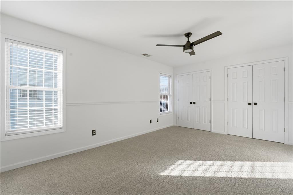 205 Towne Ridge Drive Woodstock, GA 30188 - Photo 42 of 56 a view of an empty room with a window
