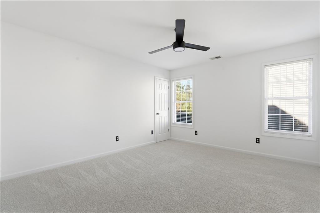 205 Towne Ridge Drive Woodstock, GA 30188 - Photo 43 of 56 a view of an empty room with a window