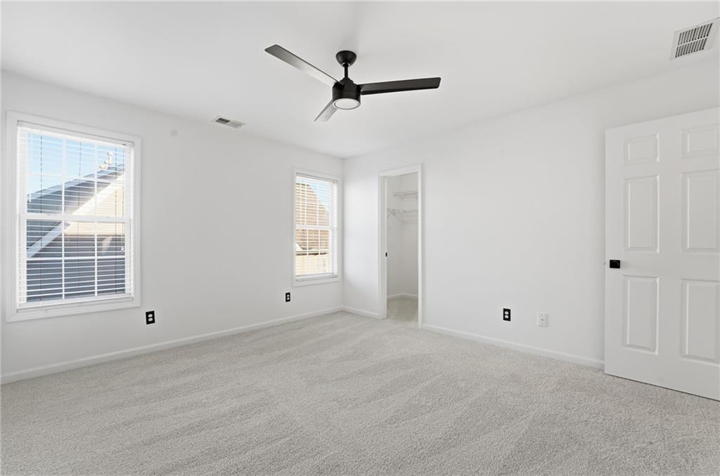 205 Towne Ridge Drive Woodstock, GA 30188 - Photo 44 of 56 a view of an empty room with a window