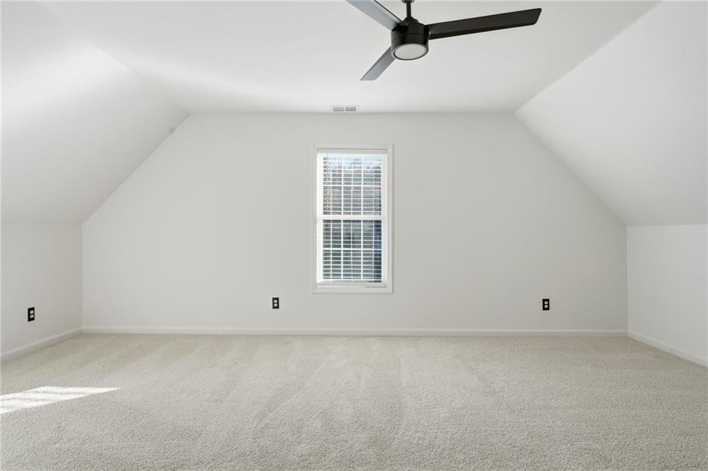 205 Towne Ridge Drive Woodstock, GA 30188 - Photo 47 of 56 an empty room with a window