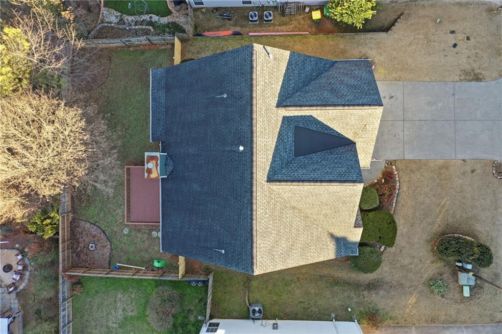 205 Towne Ridge Drive Woodstock, GA 30188 - Photo 5 of 56 an aerial view of a house with a yard