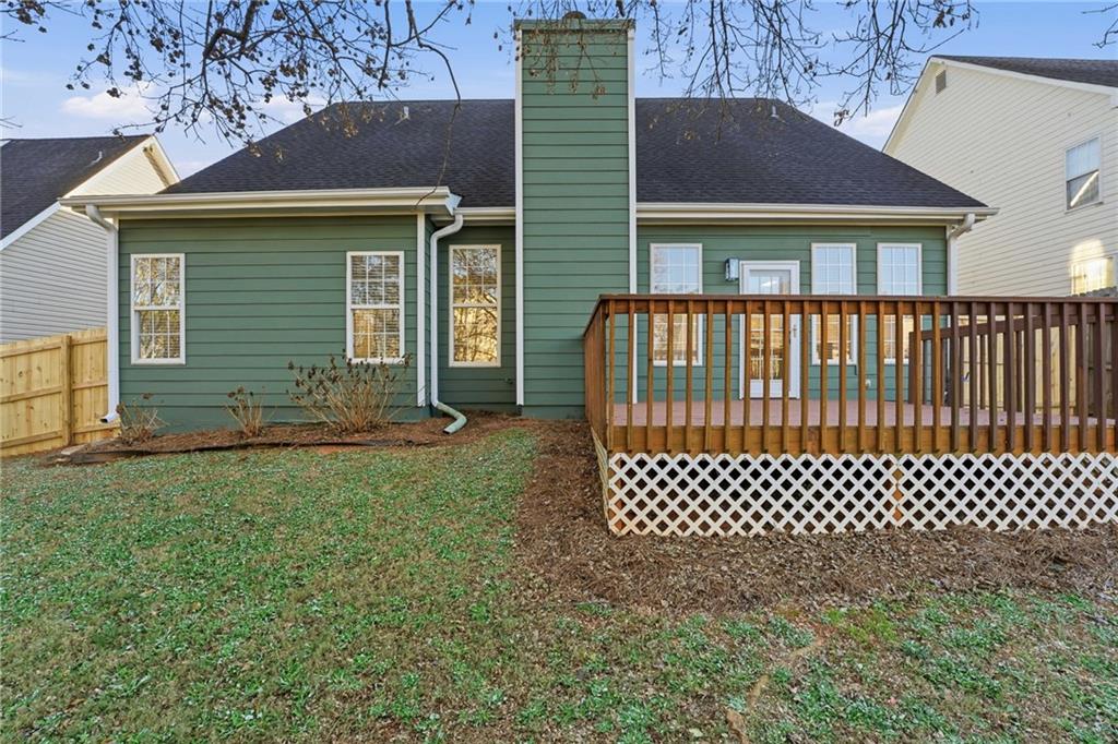 205 Towne Ridge Drive Woodstock, GA 30188 - Photo 52 of 56 a front view of a house with a garden