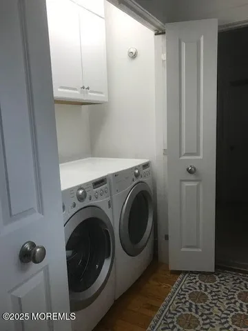 a bedroom with double bed and a window