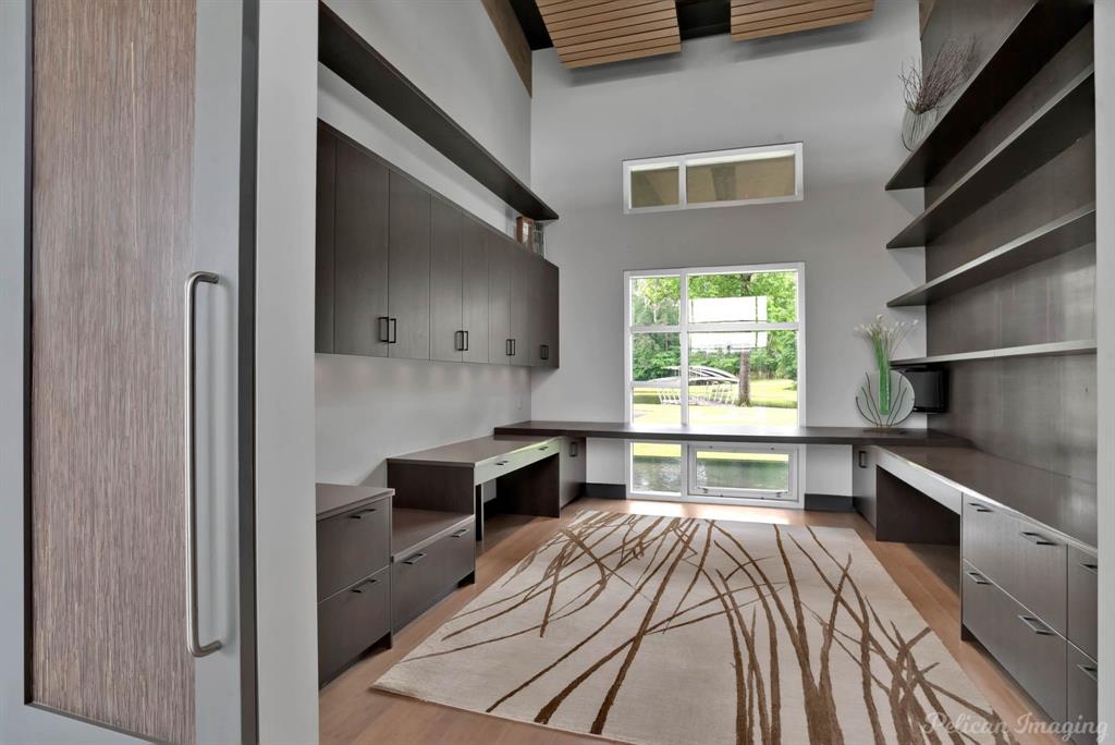 613 Moore Road Elm Grove, LA 71051 - Photo 11 of 40 a room with a bed and a wooden floor