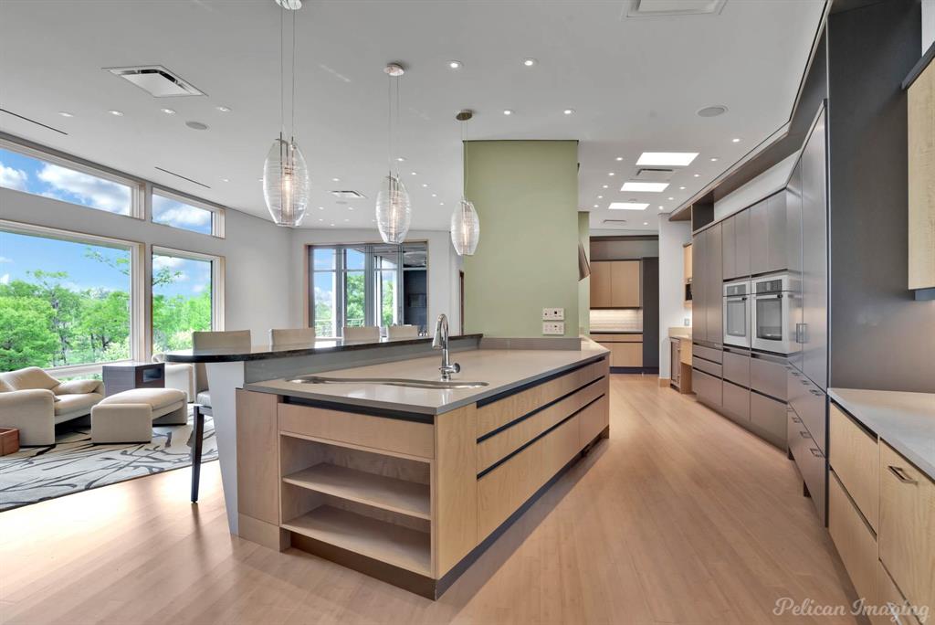 613 Moore Road Elm Grove, LA 71051 - Photo 13 of 40 Lovely den conveniently located next to the kitchen and offering access to the deck and outside cooking area