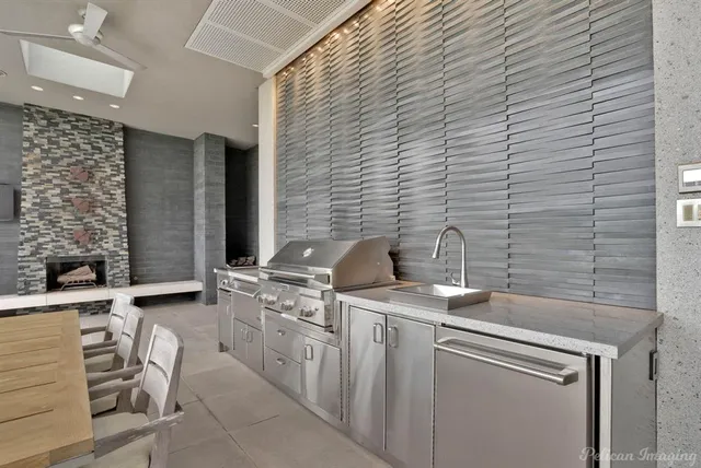 a spacious bathroom with a sink and a mirror