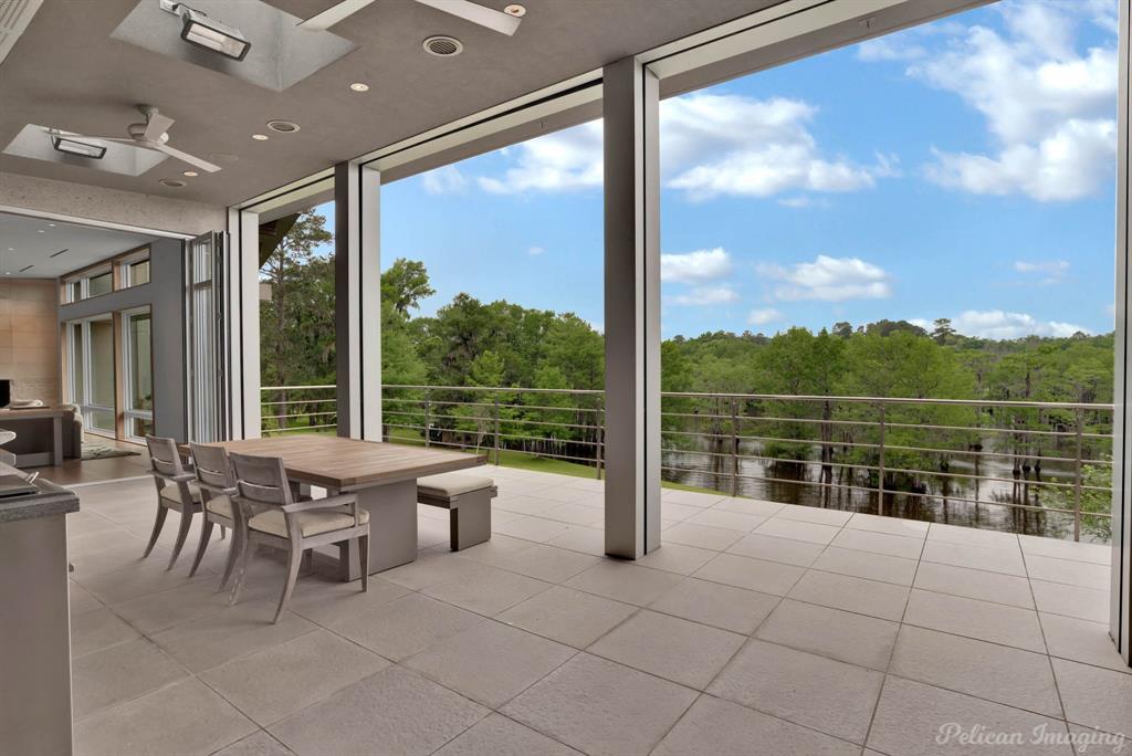 613 Moore Road Elm Grove, LA 71051 - Photo 17 of 40 a view of a balcony with chairs and a table