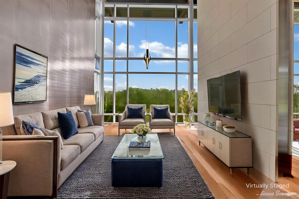 613 Moore Road Elm Grove, LA 71051 - Photo 10 of 40 a living room with furniture tv and a fireplace