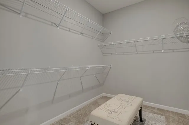 a bed room with a bed and a tv