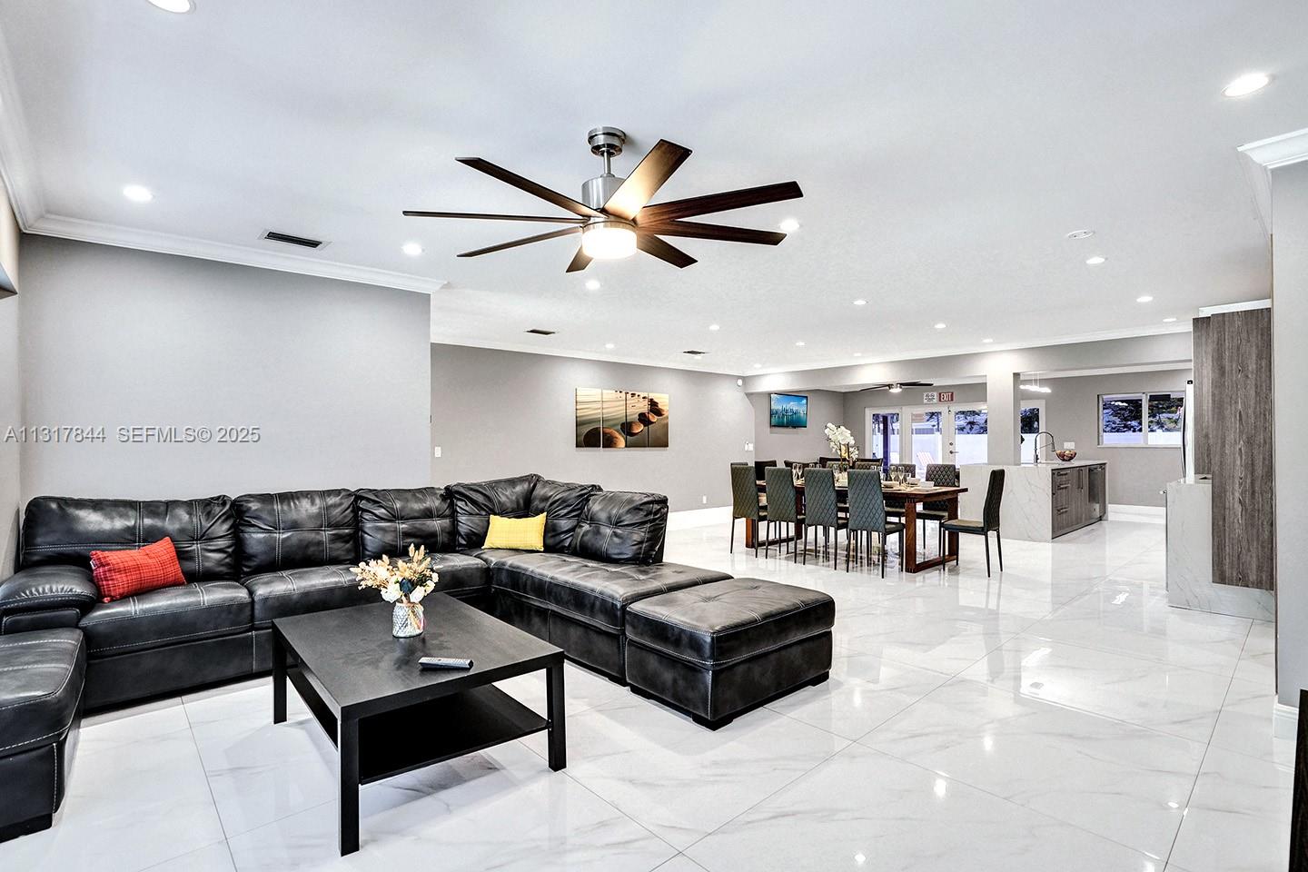 1301 Rodman Street Hollywood, FL 33019 - Photo 23 of 48 a living room with furniture and kitchen view