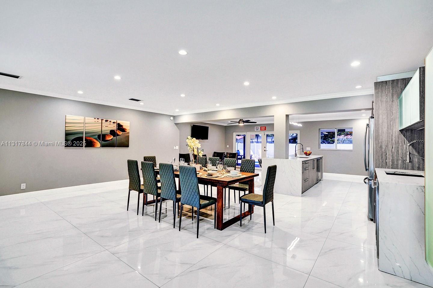 1301 Rodman Street Hollywood, FL 33019 - Photo 30 of 48 a view of a dining area with furniture