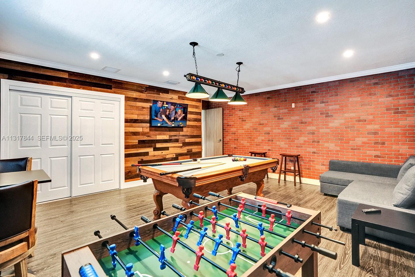 1301 Rodman Street Hollywood, FL 33019 - Photo 33 of 48 a room with musical instruments