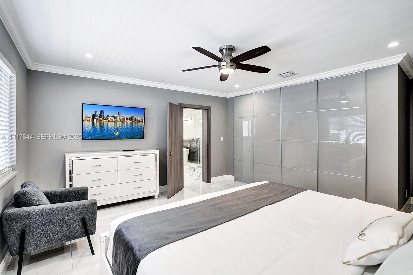 1301 Rodman Street Hollywood, FL 33019 - Photo 39 of 48 a bedroom with a bed and furniture