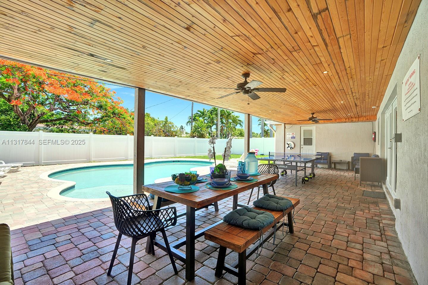 1301 Rodman Street Hollywood, FL 33019 - Photo 5 of 48 a outdoor space with furniture