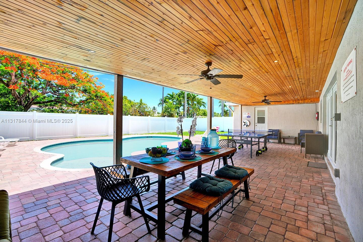 1301 Rodman Street Hollywood, FL 33019 - Photo 6 of 48 a outdoor space with furniture