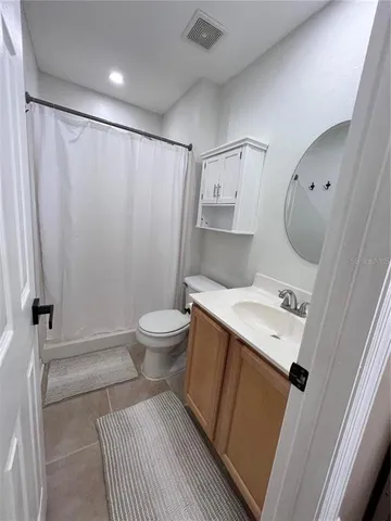 a bathroom with a bath tub