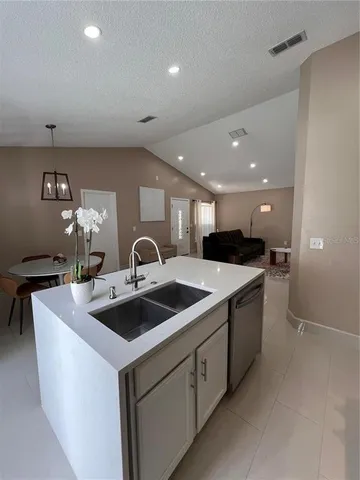 a living room with furniture and a couch