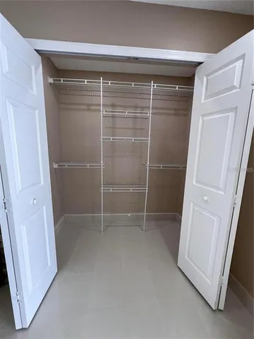 a bedroom with a bed and a view living room