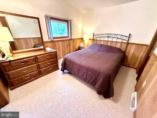 222 Skippers Point Road Oakland, MD 21550 - Photo 23 of 57 a bedroom with a bed and a window
