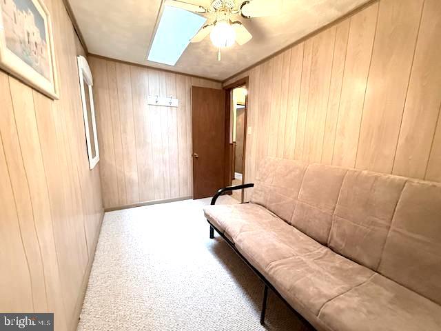 222 Skippers Point Road Oakland, MD 21550 - Photo 25 of 57 a bedroom with a large bed and a chandelier