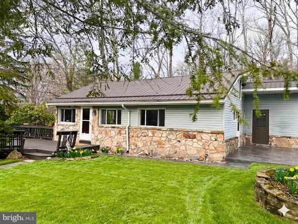 a front view of house with yard