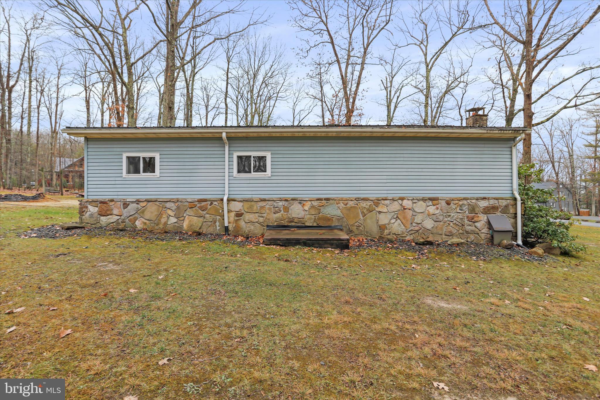 222 Skippers Point Road Oakland, MD 21550 - Photo 46 of 57 back of home- flat yard, lots of room to play!