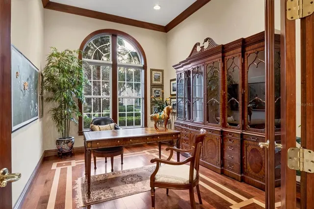 a bathroom with a sink mirror and toilet