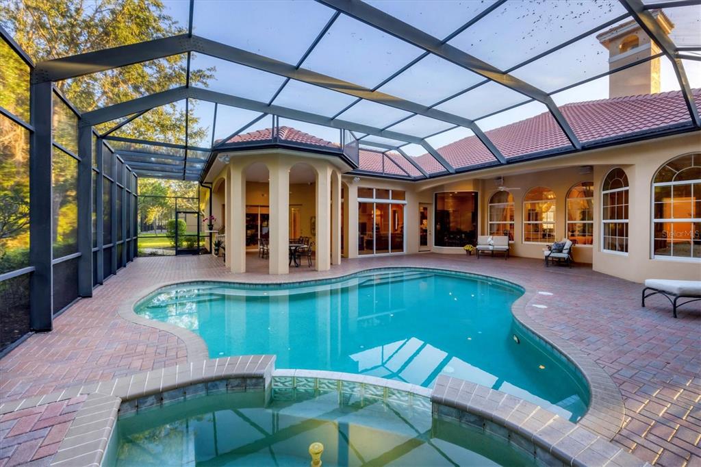 7815 Mathern Court Lakewood Ranch, FL 34202 - Photo 45 of 55 a view of a house with a swimming pool